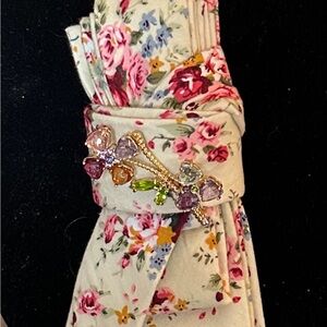 Floral Pearl Necklace with Bow by [Brand]